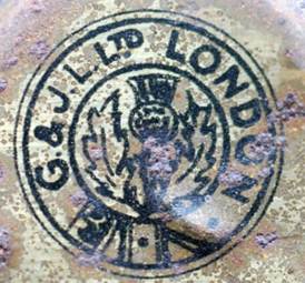 A close up of a coin

Description automatically generated with medium confidence