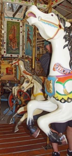 A close-up of a carousel

Description automatically generated