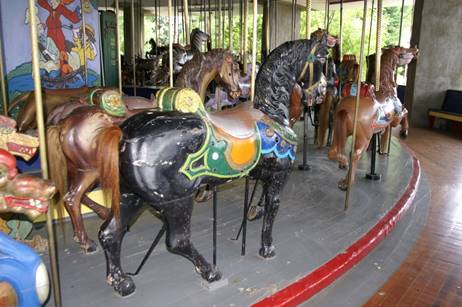 A close up of a carousel
Description generated with high confidence