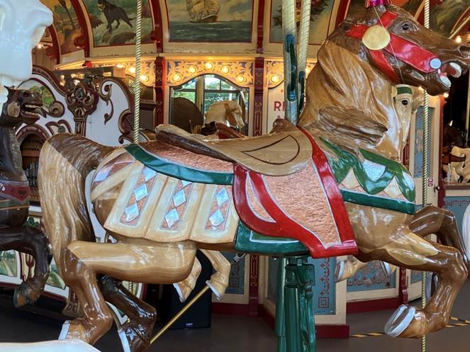 A carousel with a horse

AI-generated content may be incorrect.