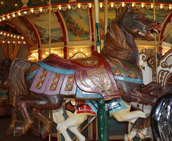 A close up of a carousel

Description generated with high confidence