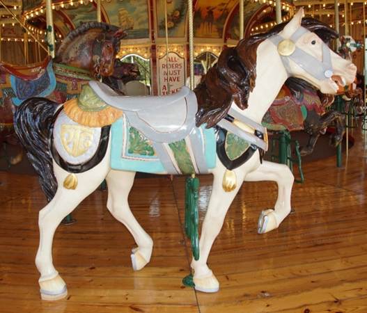 A close up of a carousel
Description generated with high confidence