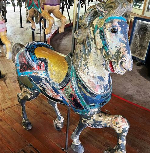 A horse on a carousel

AI-generated content may be incorrect.