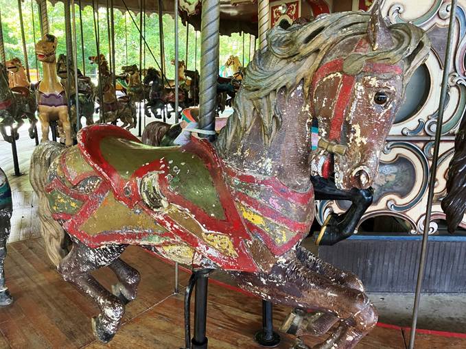 A merry go round with a horse
AI-generated content may be incorrect.