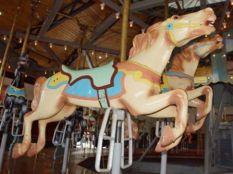 A picture containing indoor, floor, table, carousel

Description automatically generated