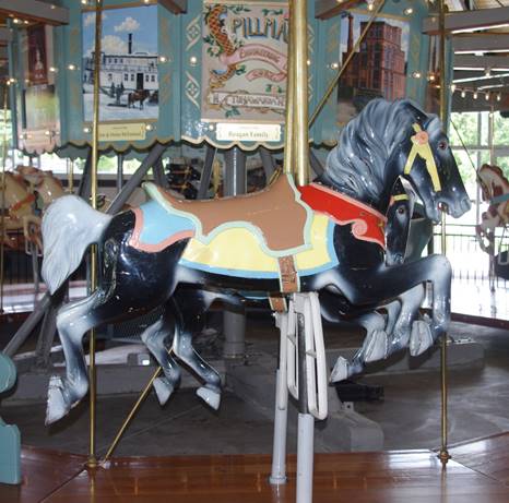 A chair sitting in front of a store

Description automatically generated