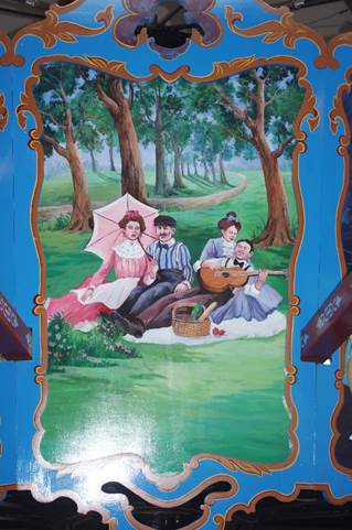 A painting of a family on a picnic
Description automatically generated