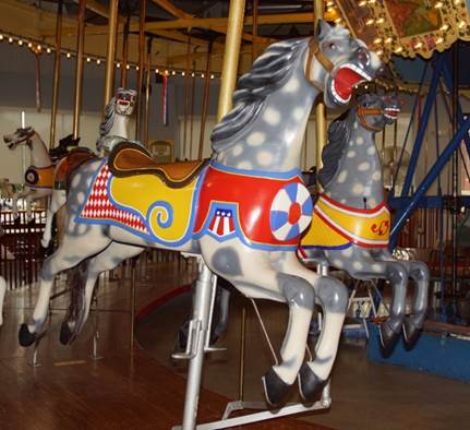 A close up of a carousel

Description automatically generated