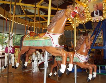 A close up of a carousel

Description automatically generated