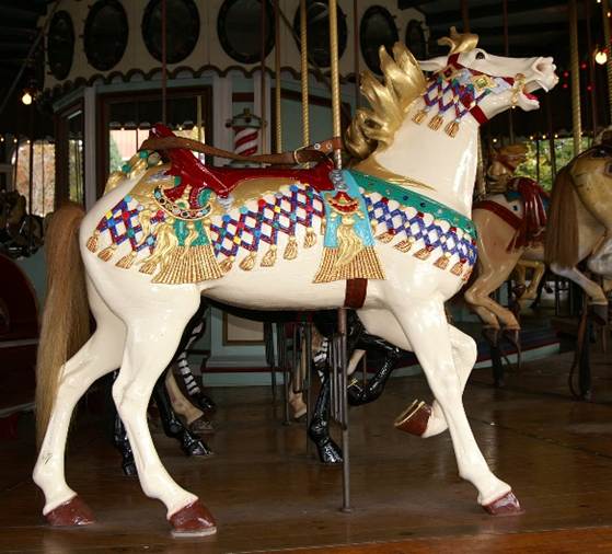 A white horse with colorful decorations

Description automatically generated