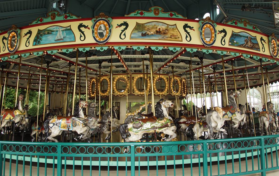 A close up of a carousel
Description generated with very high confidence