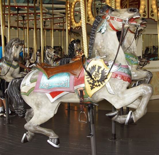 A picture containing floor, carousel, indoor, outdoor object
Description generated with very high confidence