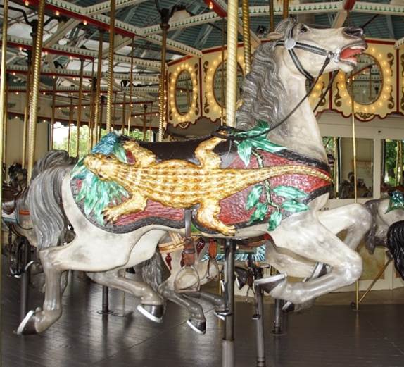 A picture containing carousel, floor, ride, building
Description generated with very high confidence