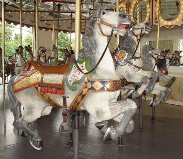 A picture containing indoor, floor, carousel, building

Description generated with very high confidence