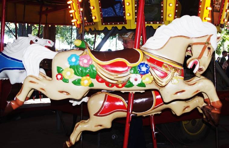 A close up of a carousel
Description generated with high confidence