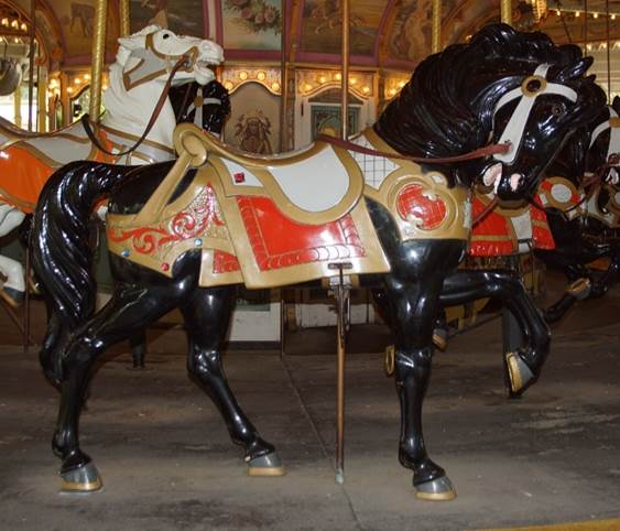 A motorcycle on display in a room

Description generated with high confidence