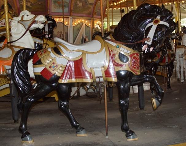 A close up of a carousel

Description generated with high confidence