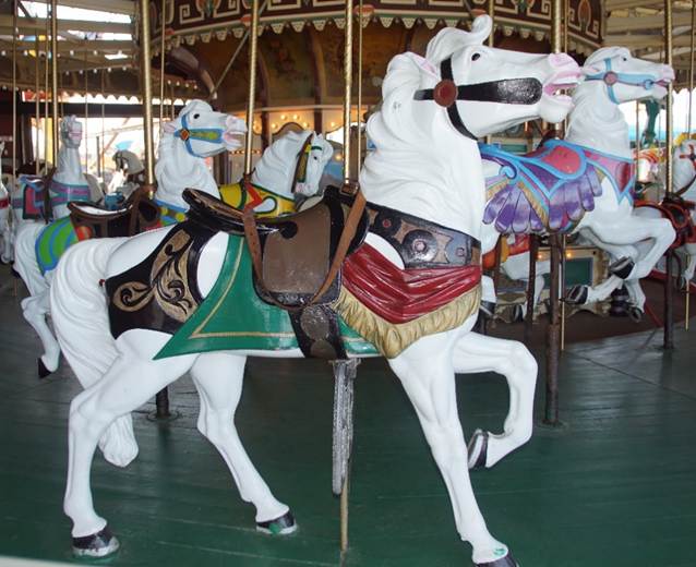 A picture containing floor, indoor, carousel, building
Description generated with very high confidence