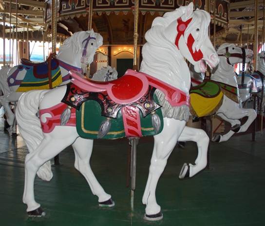 A picture containing floor, indoor, carousel, wall
Description generated with very high confidence