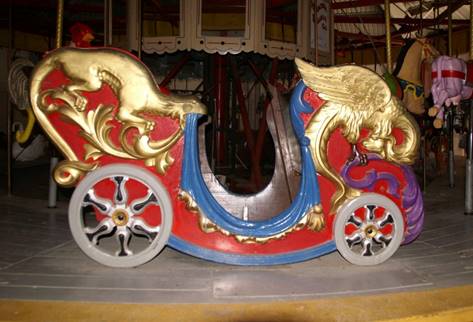 A picture containing building, bicycle, sitting, small

Description automatically generated