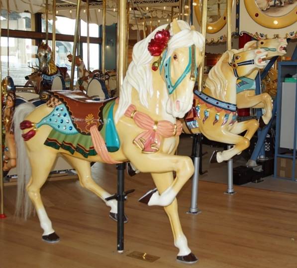 A picture containing floor, indoor, carousel, outdoor object

Description automatically generated