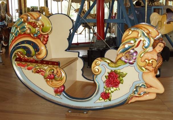 A picture containing table, indoor, carousel, ride
Description automatically generated