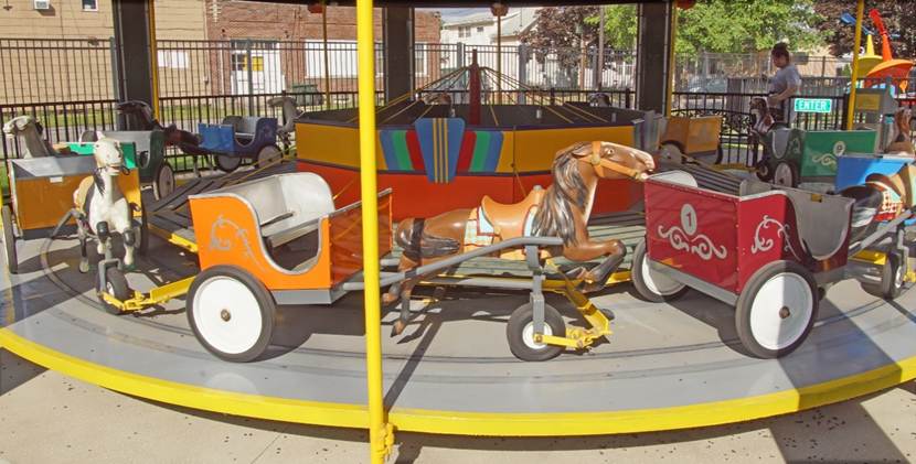 A picture containing outdoor, transport, yellow, cart
Description automatically generated