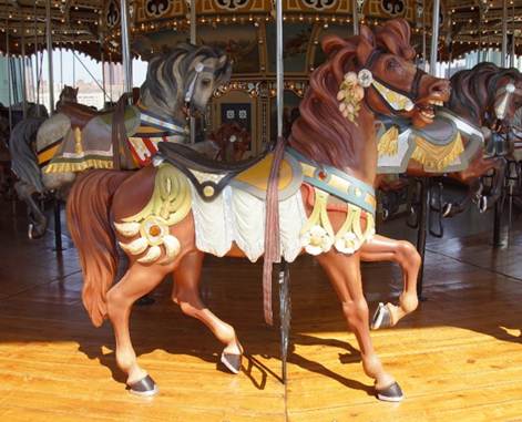 A close-up of a carousel
Description automatically generated