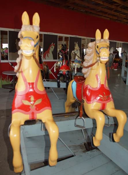 A picture containing floor, indoor, yellow, statue
Description automatically generated