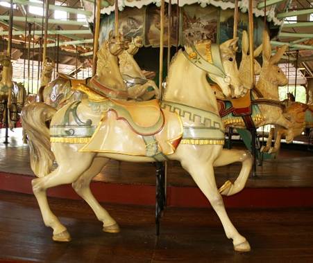 A carousel with horses and animals
Description automatically generated