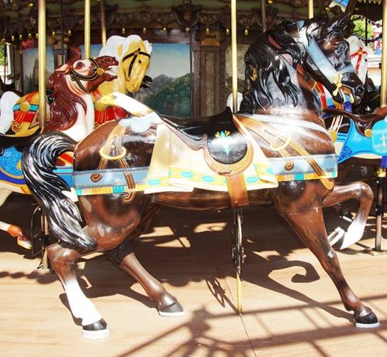 A horse on a merry go round

Description automatically generated