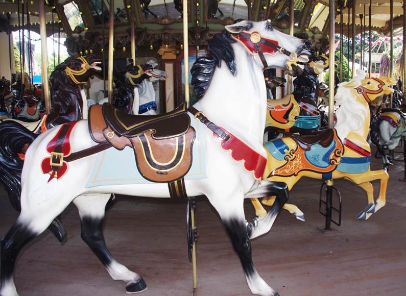 A close-up of a merry-go-round
Description automatically generated