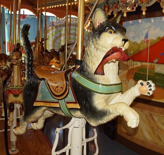 A picture containing carousel, outdoor object, ride, indoor

Description automatically generated