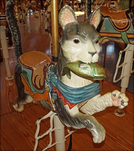 A picture containing indoor, floor, table, sitting
Description automatically generated