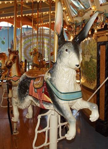 A picture containing carousel, outdoor object, ride, indoor

Description automatically generated