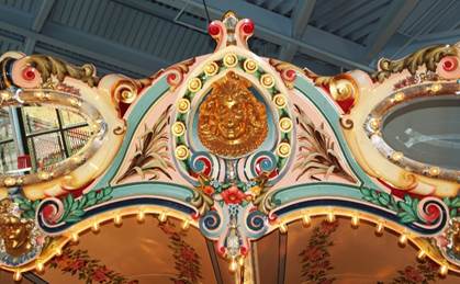 A close up of a carousel

Description automatically generated