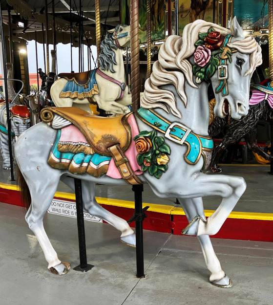 A horse on a merry go round

AI-generated content may be incorrect.