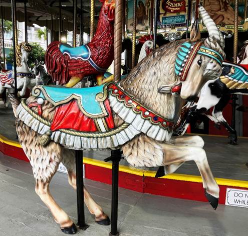 A horse and rooster on a merry go round

AI-generated content may be incorrect.