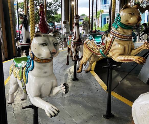 A group of animals on a carousel
AI-generated content may be incorrect.