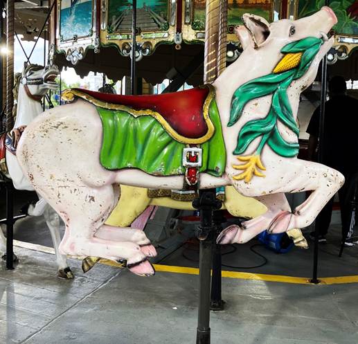 A pig on a merry go round

AI-generated content may be incorrect.