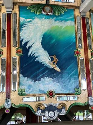 A painting of a person surfing on a wave

AI-generated content may be incorrect.