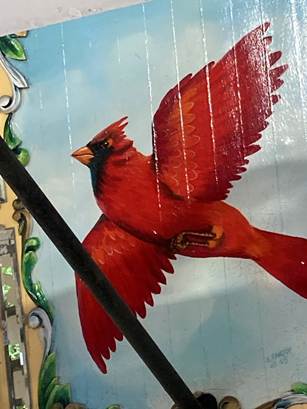 A painting of a bird on a wall

AI-generated content may be incorrect.