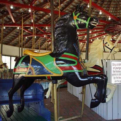 A picture containing indoor, floor, table, sitting
Description generated with very high confidence