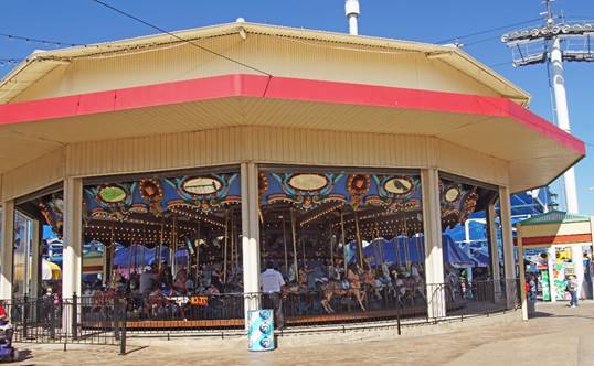A group of people standing in front of a building
Description generated with very high confidence