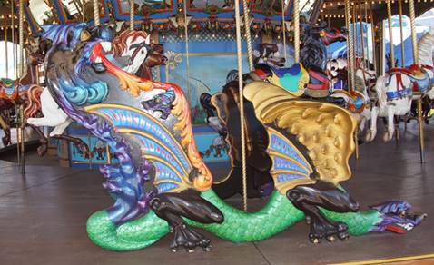 A group of people in a carousel
Description generated with high confidence