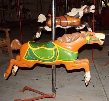 A picture containing floor, ground, chair, sitting
Description generated with very high confidence