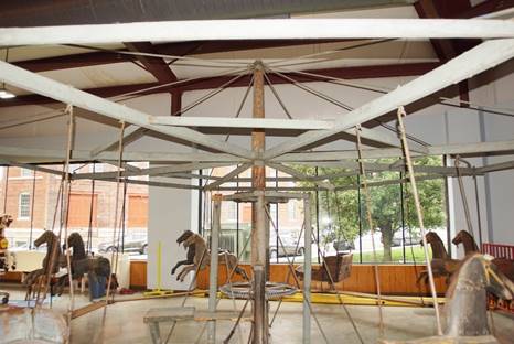 A group of people in a room
Description automatically generated