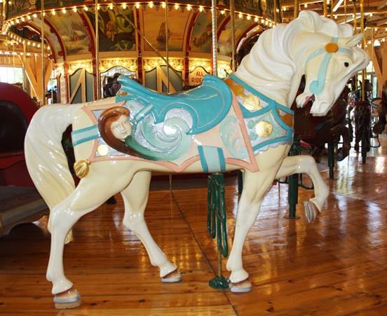 A close up of a carousel

Description generated with high confidence