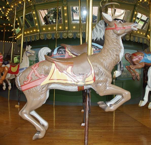 A picture containing outdoor object, floor, carousel, indoor
Description automatically generated