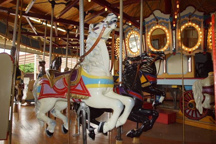 A close up of a carousel

Description automatically generated